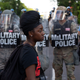 Military police form a riot line in coordination outside the White House on June 1, 2020.